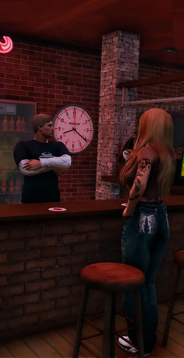 A bartender behind the bar talking to a customer