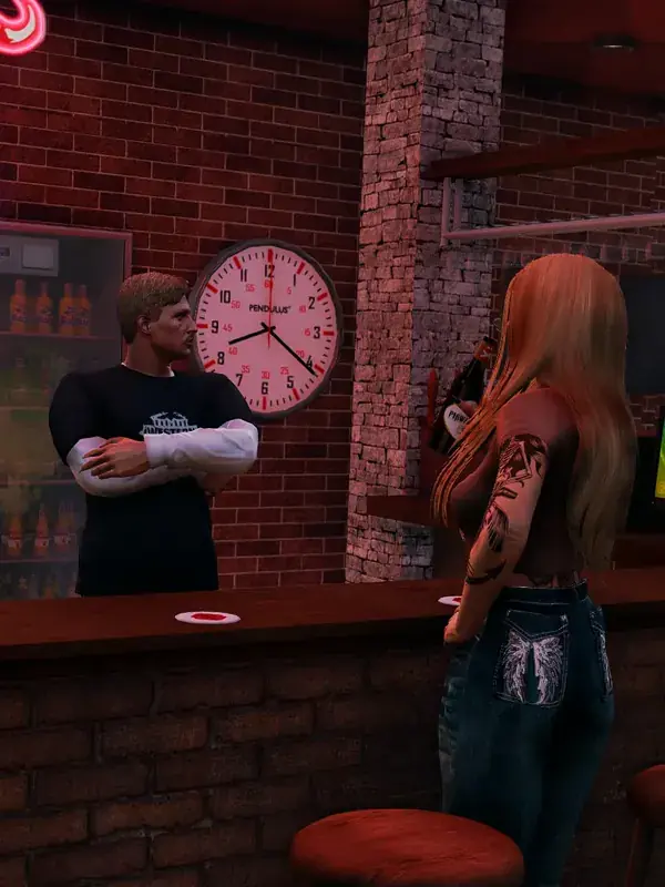 A bartender behind the bar talking to a customer